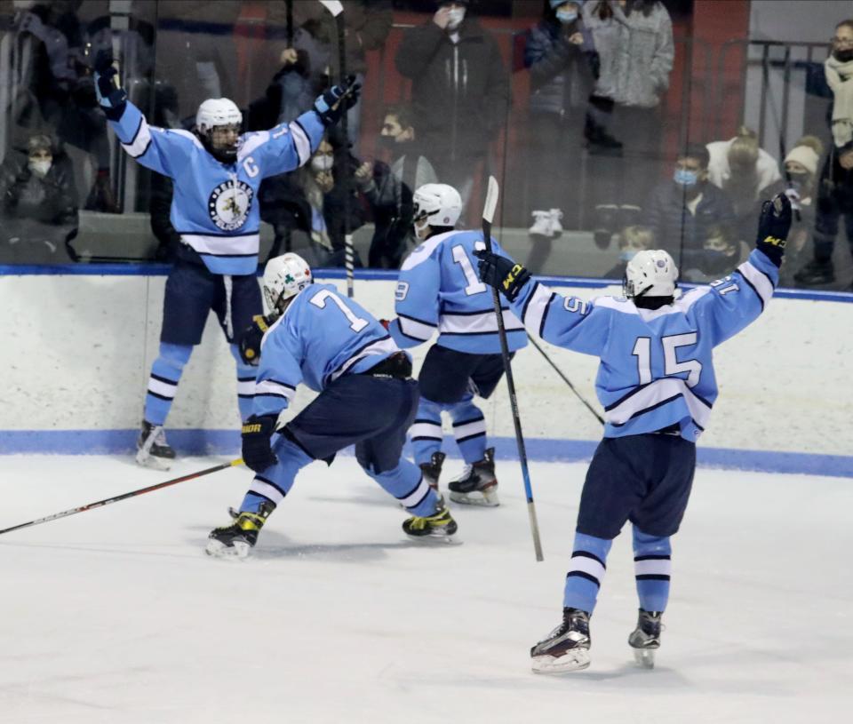 Pelham celebrates its first goal during a varsity hockey game against Rye at the Playland Ice Casino in Rye Jan. 19, 2022. Pelham defeated Rye 7-0.