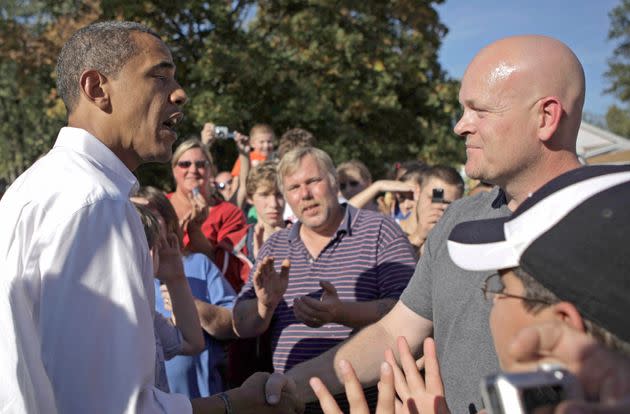 In this Oct. 12, 2008, photo, Democratic presidential candidate Barack Obama talks to plumber Joe Wurzelbacher at an Ohio event. Wurzelbacher, who came to be known nationally as 