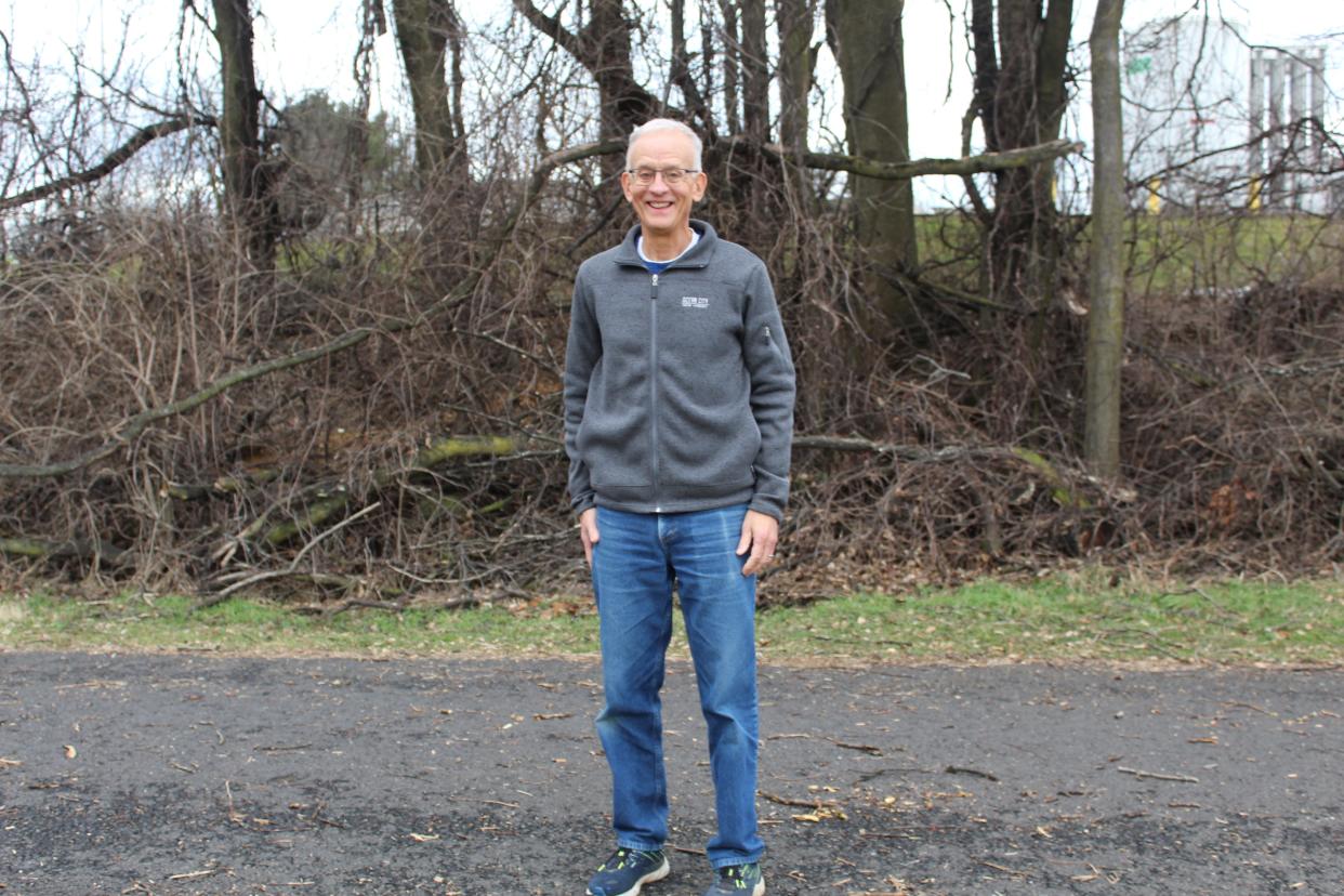 The backyard of the Newhart's home is gives them direct access to the Lebanon Valley Rail-Trail, which he uses frequently for his marathon training.