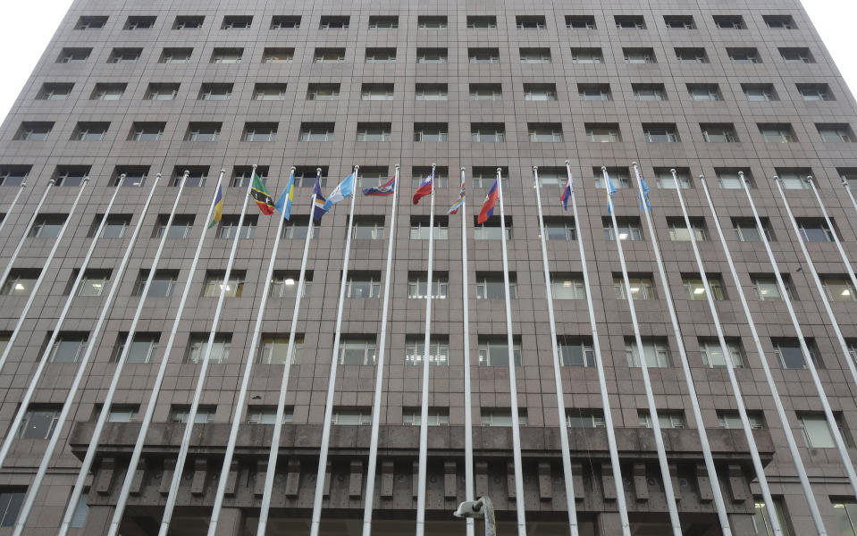A row of flagpoles carries the flags of diplomatic allies at the Diplomatic Quarter building in Taipei, Taiwan, Monday, Jan. 15, 2024. The Pacific Island nation of Nauru says it is switching diplomatic recognition from Taiwan to China. The move on Monday leaves Taiwan with 12 diplomatic allies around the world. Taiwan now has official ties with 11 countries and the Vatican. (AP Photo/Chiang Ying-ying)