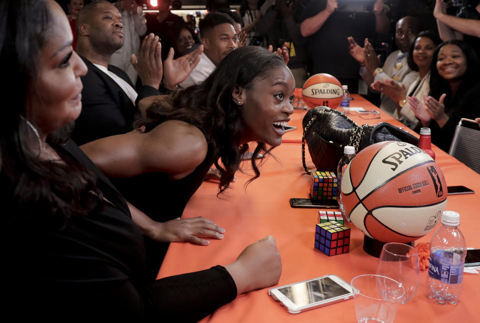 Kaela Davis reacts after being selected as the the 10th overall pick in the WNBA basketball draft by the Dallas Wings, Thursday, April 13, 2017, in New York. (AP Photo/Julie Jacobson)