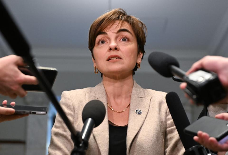 Quebec Immigration Minister Christine Frechette responds to reporters questions before entering a cabinet meeting, Wednesday, November 2, 2022 at the legislature in Quebec City. 