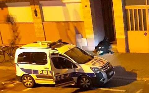 A dead body lays in the doorway of a building after a shootout with police in Strasbourg, eastern France, Thursday, Dec. 13, 2018.  - Credit: UGC