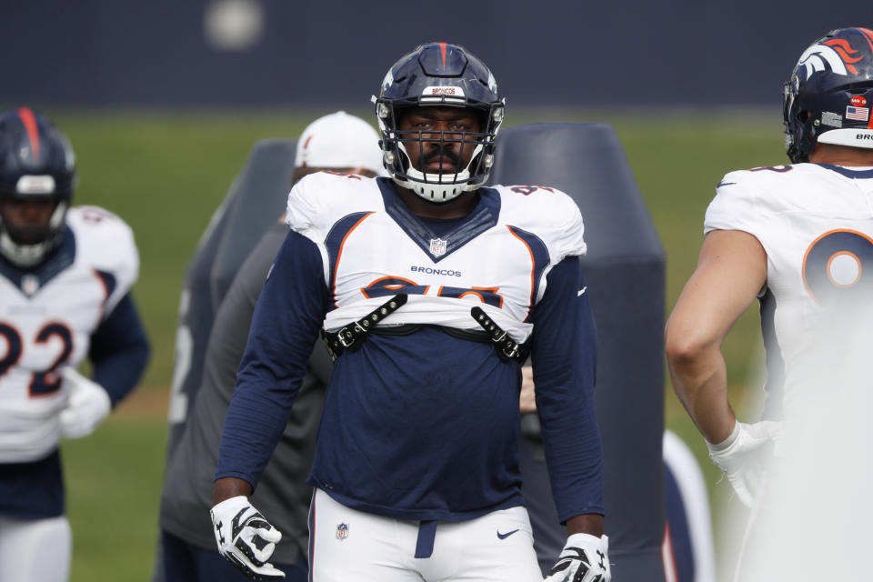 FILE - Denver Broncos defensive tackle Shelby Harris completes a drill during a combined NFL football training camp against the San Francisco 49ers at the Broncos' headquarters on Aug. 16, 2019, in Englewood, Colo. The Cleveland Browns are signing veteran free agent defensive tackle Harris, a person familiar with the negotiations told The Associated Press on Wednesday, Aug. 8, 2023. (AP Photo/David Zalubowski, File)