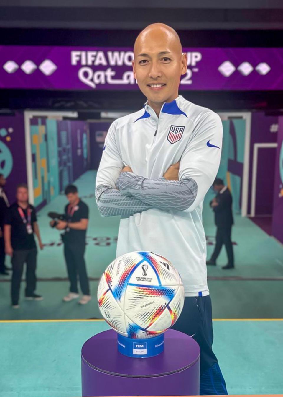 Aurora Medical Center – Sheboygan County Athletic Trainer Yoshi Ono poses in 2022 in Qatar where he helped world class athletes stay in top shape for the World Cup.