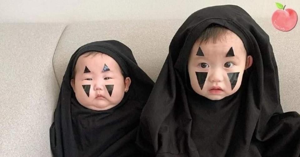 <p>兩個小男孩裝扮成神隱少女裡的「無臉男」。| The two young boys were dressed up as the “No-Face” (Courtesy of PANG เด็กน้อย/Facebook)</p>
