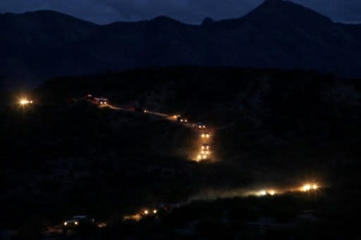 Members of the Mormon LeBaron community arrive in a convoy from the United States to the municipality of Bavispe, in Mexico's Sonora Mountains on November 6