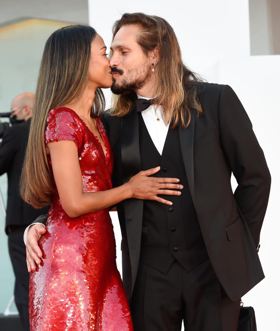 Zoe Saldana and her husband Italian artist Marco Perego at the 78 Venice International Film Festival 2021. The Hand of God (E' stata la mano di Dio) red carpet. Venice (Italy), September 2nd, 2021