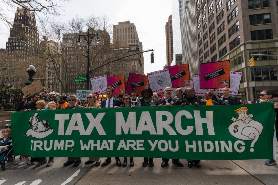 MIDTOWN MANHATTAN, NEW YORK, UNITED STATES - 2017/04/15: Demonstrators in New York City rallied at Bryant Park in Midtown Manhattan before march to Trump Tower as part of a nationwide series of demonstrations to demand the release of President Donald J. Trump's past income tax returns. The march coincides with the deadline for filing 2016 income tax returns in the United States. (Photo by Albin Lohr-Jones/Pacific Press/LightRocket via Getty Images)