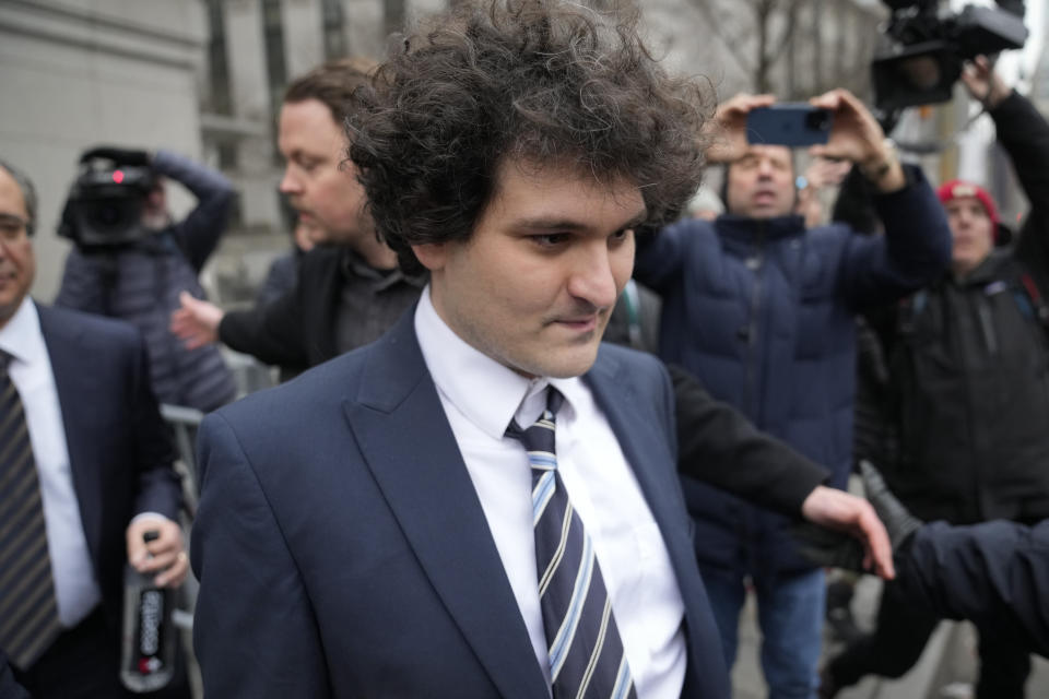 Samuel Bankman-Fried departs Manhattan federal court in New York, Thursday, Feb. 9, 2023, in New York. (AP Photo/John Minchillo)