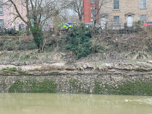 The scene in the Bedminster area of Bristol after a car went through railings and into the River Avon (Ben Birchall/PA)