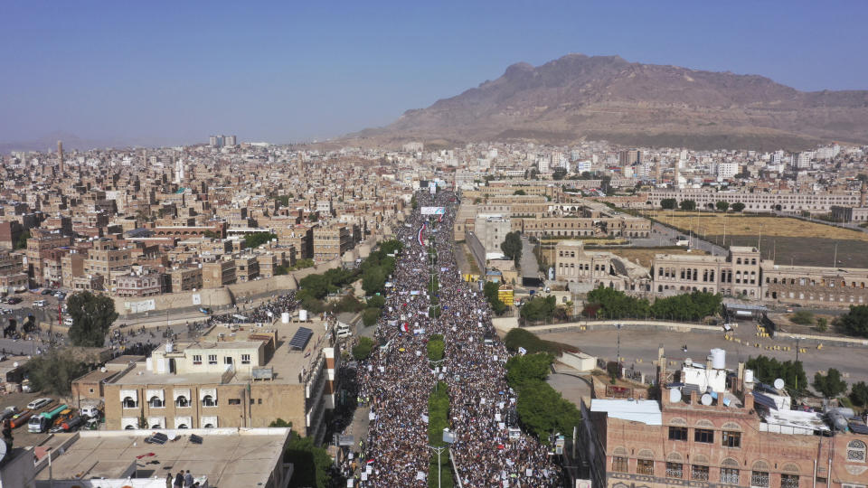 Houthi supporters attend a rally marking the seventh anniversary of the Saudi-led coalition's intervention in Yemen's war in Sanaa, Yemen, Saturday, 26 March, 2022. (AP Photo/Abdulsalam Sharhan)