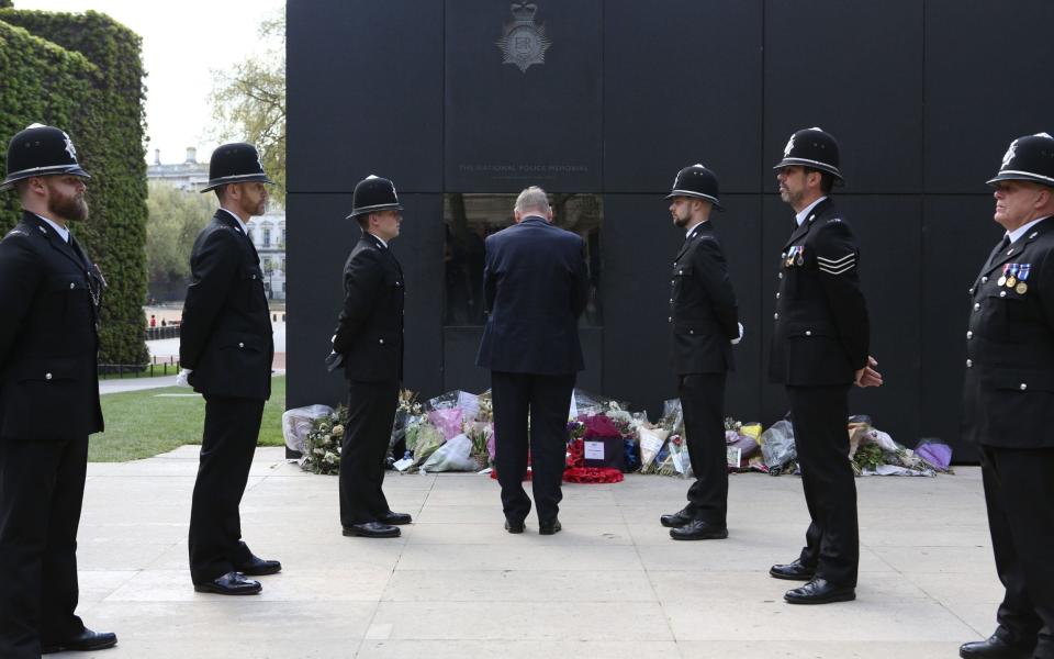 Police at a ceremony by the Police Roll of Honour Trust to add the names of fallen officers Pc Keith Palmer  - Credit: Rick Findler/PA