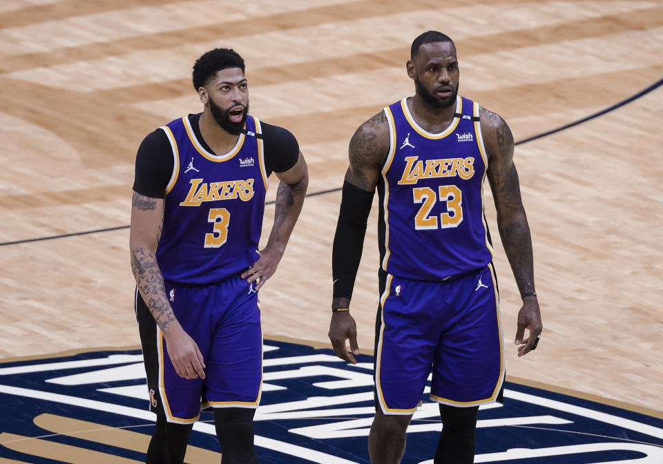 Los Angeles Lakers forward LeBron James (23) and forward Anthony Davis (3) haven't been on the court much together the past few weeks. (AP Photo/Derick Hingle)