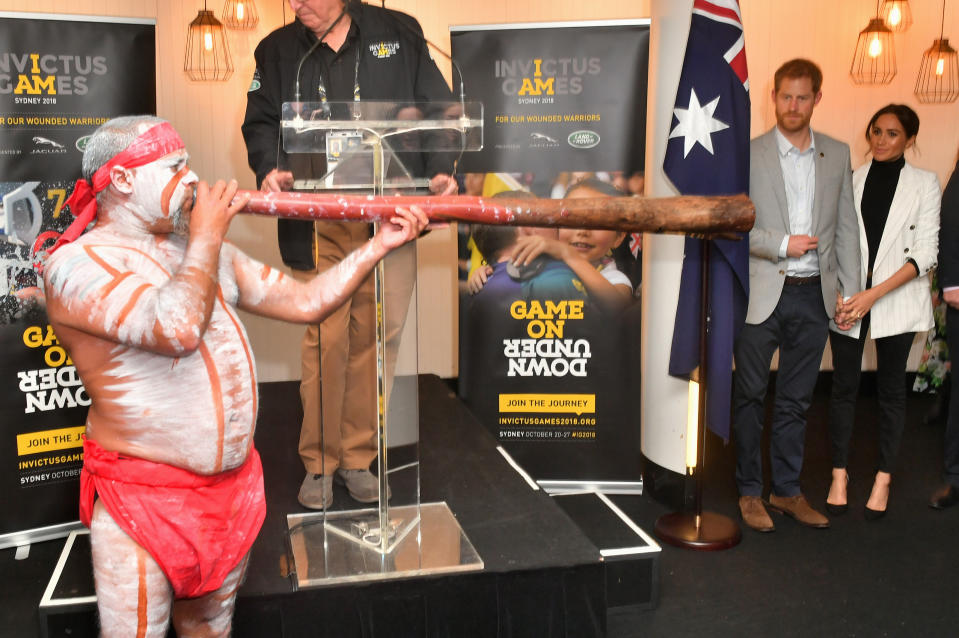 The Duke and Duchess of Sussex watched a didgeridoo performance. Photo: Getty