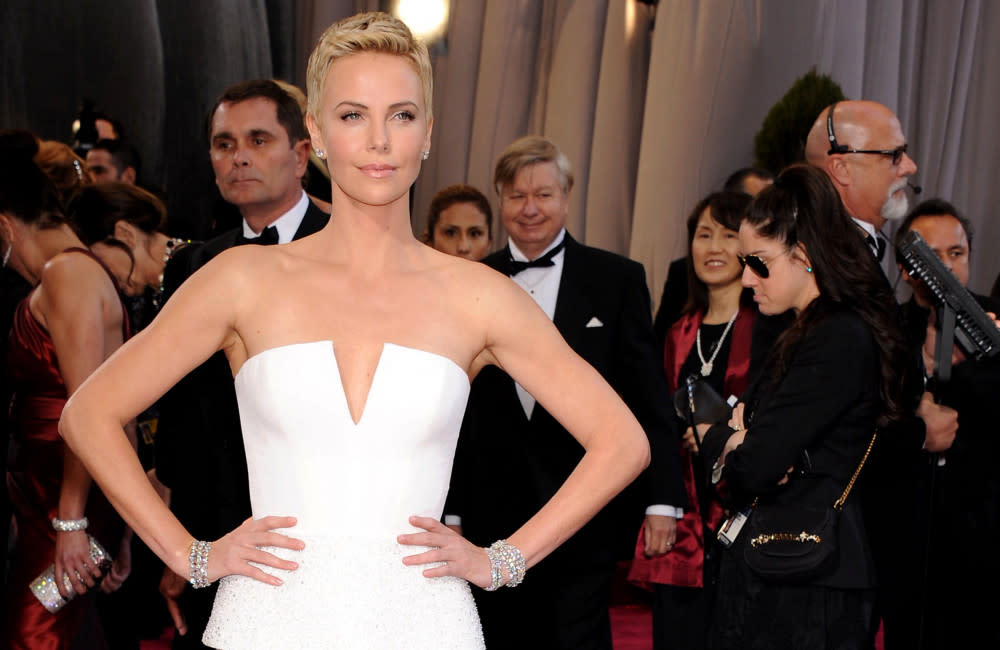 Charlize Theron has never had a level of fame like Kim Kardashian credit:Bang Showbiz