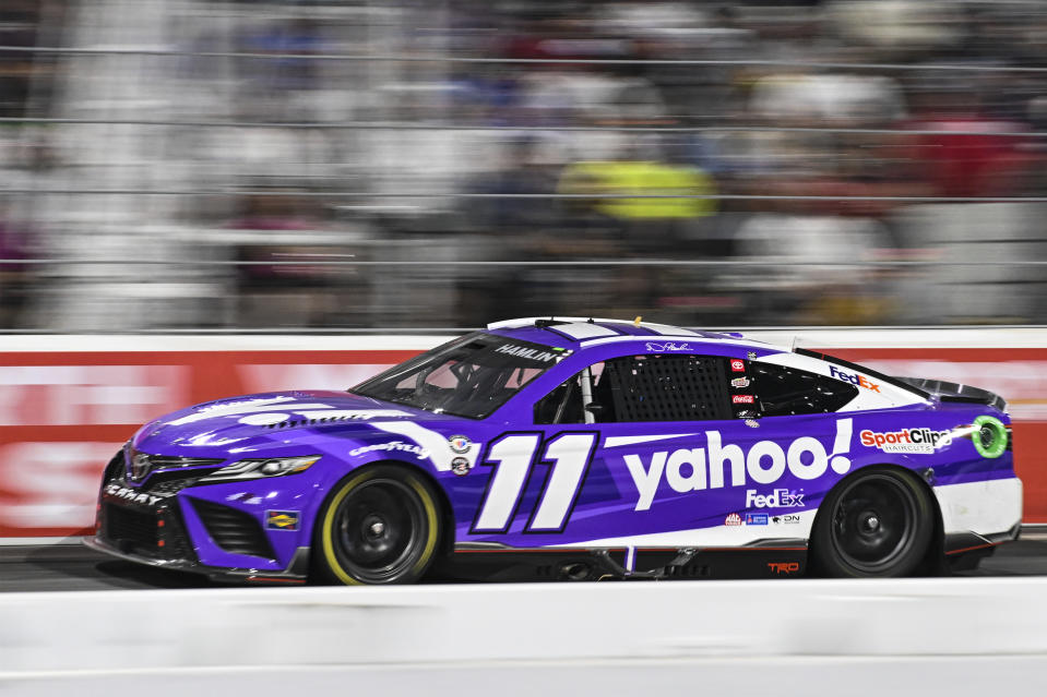 Denny Hamlin (11) competes during the NASCAR All-Star Cup Series auto race at North Wilkesboro Speedway, Sunday, May 21, 2023, in North Wilkesboro, N.C. (AP Photo/Matt Kelley)