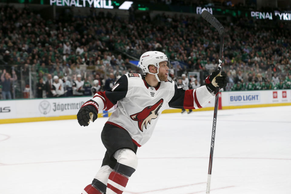 Arizona Coyotes left wing Taylor Hall celebrates his goal against the Dallas Stars during the second period of an NHL hockey game in Dallas, Wednesday, Feb. 19, 2019. (AP Photo/Michael Ainsworth)