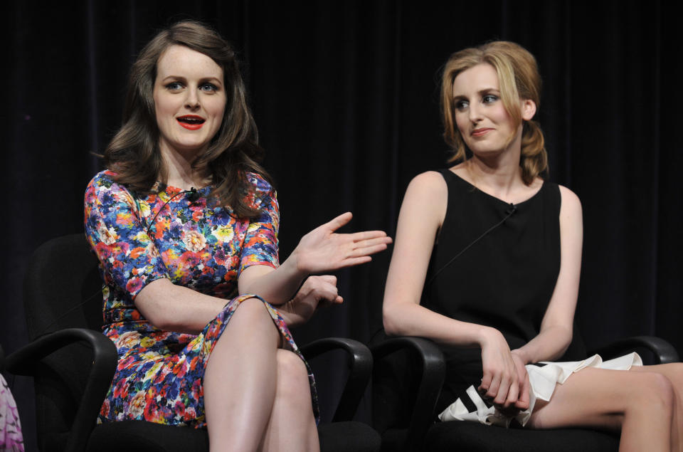 Sophie McShera, left, and Laura Carmichael, cast members in the Masterpiece series "Downton Abbey," take part in a panel discussion on the show at the PBS Summer 2013 TCA press tour at the Beverly Hilton Hotel on Tuesday, Aug. 6, 2013 in Beverly Hills, Calif. (Photo by Chris Pizzello/Invision/AP)