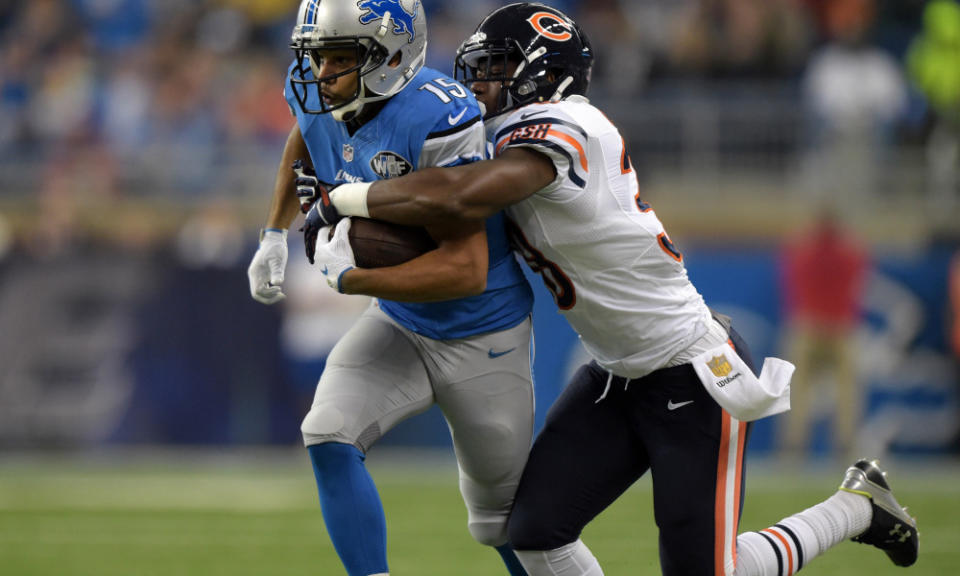 Oct 18, 2015; Detroit, MI, USA; Detroit Lions receiver Golden Tate (15) is defended by Chicago Bears safety Adrian Amos (38) in a NFL game at Ford Field. Mandatory Credit: Kirby Lee-USA TODAY Sports