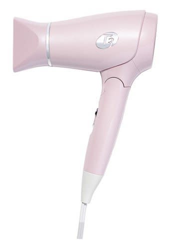 T3 Featherweight Compact Folding Dryer, Soft Pink. 34% off from $150. <a href="https://jet.com/product/T3-Featherweight-Compact-Folding-Dryer-Soft-Pink/880911cbd29d493f9b7a0691ad82dbe6" target="_blank"><strong>Now $99</strong></a>. (Photo: Jet)