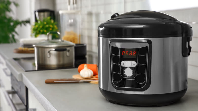 A slow cooker on a countertop