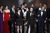 Amy Sherman-Palladino, front and center left, Daniel Palladino and the cast and crew of "The Marvelous Mrs. Maisel" accept the award for outstanding comedy series at the 70th Primetime Emmy Awards on Monday, Sept. 17, 2018, at the Microsoft Theater in Los Angeles. (Photo by Chris Pizzello/Invision/AP)