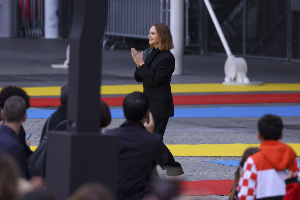 Stella McCartney accepts applause at the end of the Stella McCartney ready-to-wear Spring/Summer 2023 fashion collection presented Monday, Oct. 3, 2022 in Paris. (Photo by Vianney Le Caer/Invision/AP)