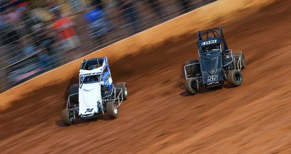 Sheldon Creed (94) races Trevor Cline (55) in non-winged 600 micro sprint competition at Millbridge Speedway in Salisbury, North Carolina, on May 24, 2022. (Adam Fenwick/NASCAR)