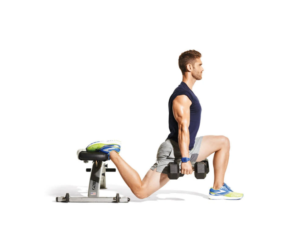 <p>James Michelfelder</p>How to Do It<ol><li>Hold a dumbbell in each hand and stand lunge length in front of a bench, to start. </li><li>Rest the top of one foot on the bench behind you. </li><li>Bend both knees and lower your body until your rear knee nearly touches the floor, keeping your torso upright.</li><li>Push through your leading foot to stand. </li><li>That's 1 rep. Perform 3-4 x 8-12 reps each side.</li></ol>