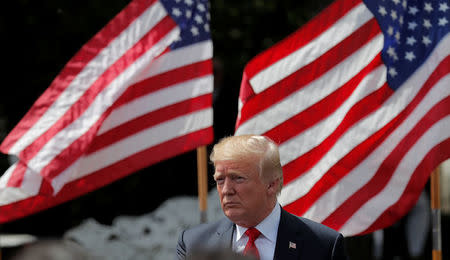 U.S. President Donald Trump participates in a "celebration of America" event on the South Lawn of the White House in Washington, U.S., June 5, 2018. REUTERS/Carlos Barria
