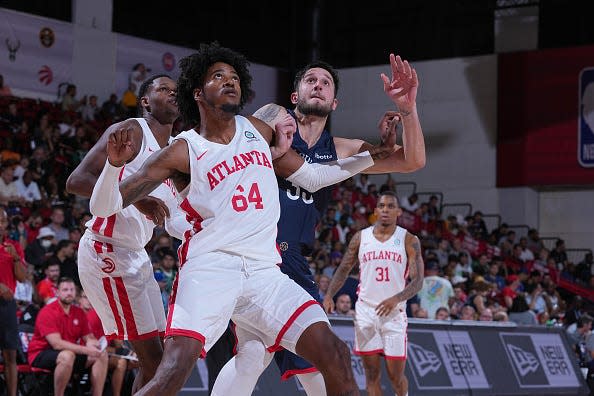 Justin Tillman #64 of the Atlanta Hawks plays defense on Zach Hankins #35 of the New Orleans Pelicans during the 2022 NBA Summer League on July 11, 2022 at the Cox Pavilion in Las Vegas, Nevada.