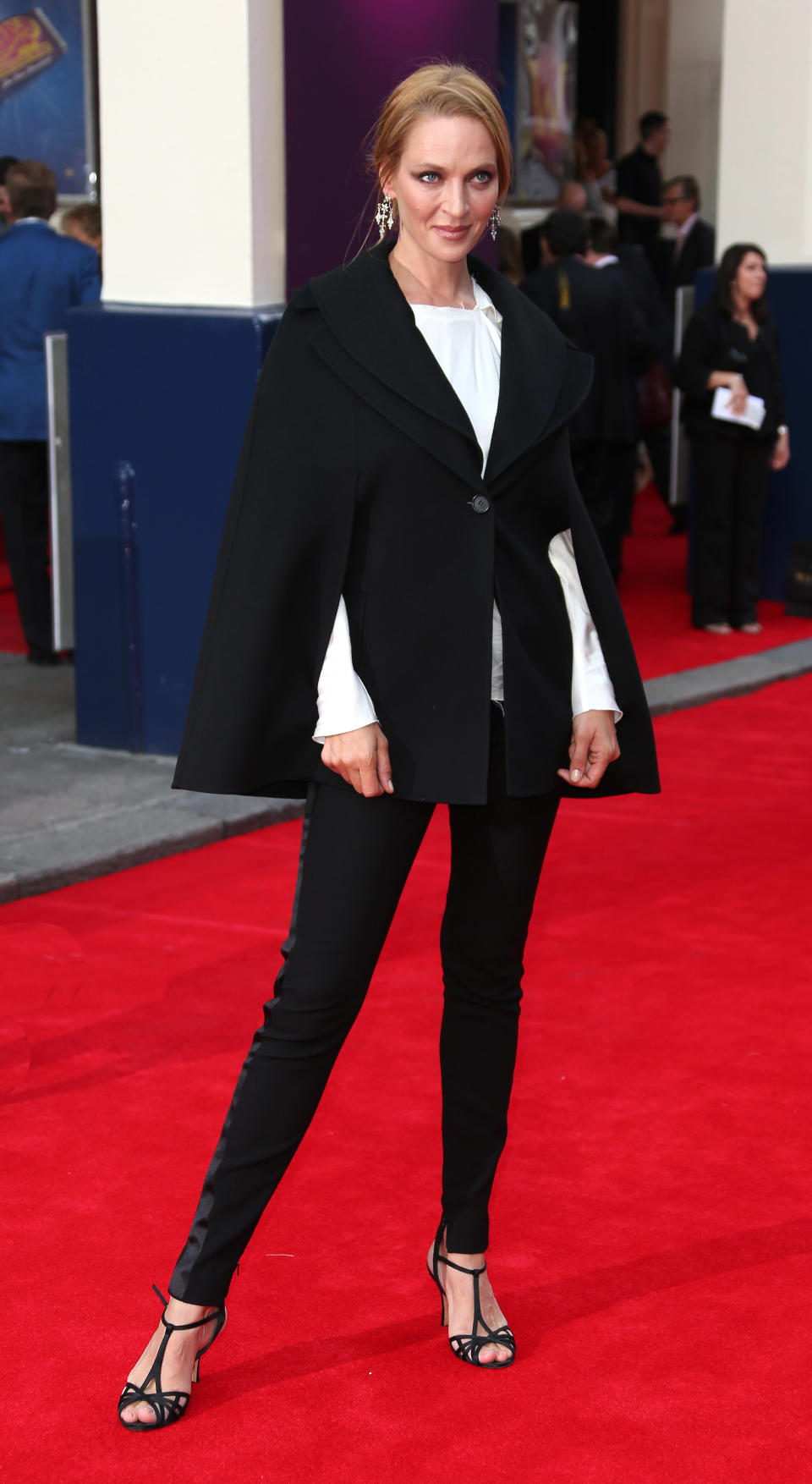 Uma Thurman arrives for the opening night of Charlie and the Chocolate Factory, a new stage musical based on Roald Dahl's popular story about Willy Wonka and his amazing Chocolate Factory, at the Drury Lane Theatre in central London, Tuesday, June 25, 2013. (Photo by Joel Ryan/Invision/AP)