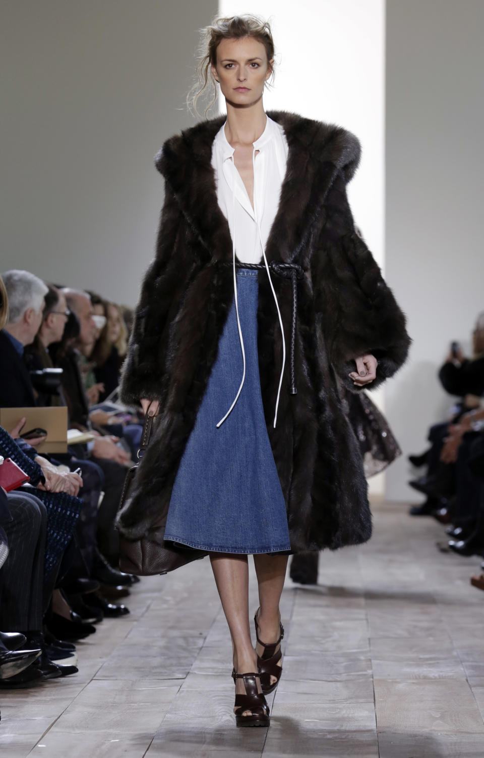 The Michael Kors Fall 2014 collection is modeled during Fashion Week in New York, Wednesday, Feb. 12, 2014. (AP Photo/Richard Drew)