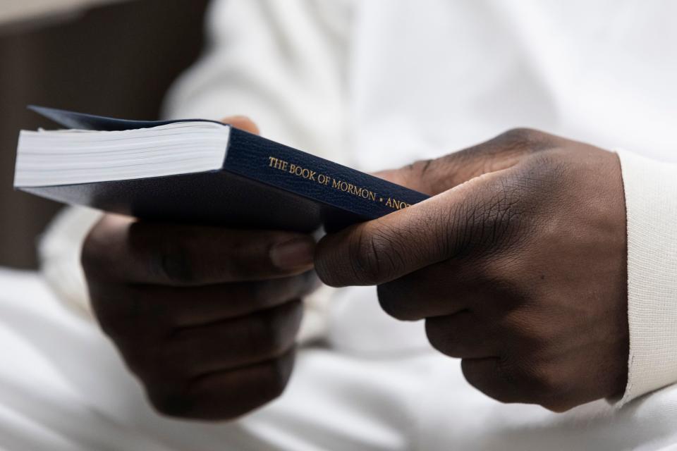James Williams holds his copy of the Book of Mormon after attending the sacrament service at The Church of Jesus Christ of Latter-day Saints’ prison ministry in Salt Lake City on Sunday, Jan. 28, 2024. | Marielle Scott, Deseret News