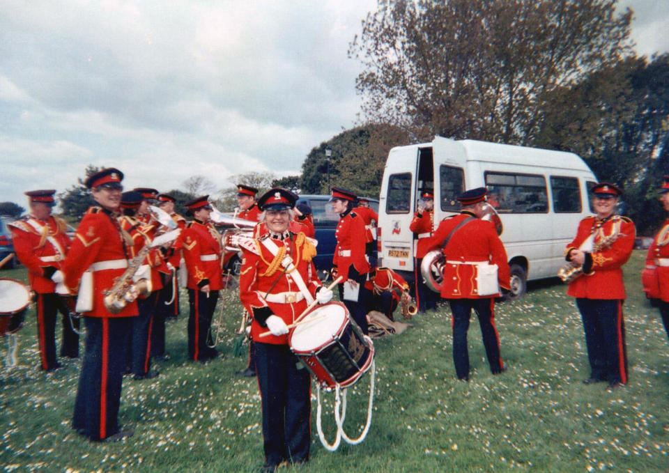 Woman marching in group 