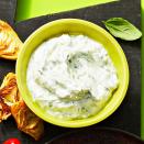 <p>For a healthier Super Bowl snack set out a bowl of this creamy, herb-filled dip and a tray of veggies. </p><p>Get the <a href="https://www.goodhousekeeping.com/food-recipes/a40784580/tzatziki-sauce-recipe/" rel="nofollow noopener" target="_blank" data-ylk="slk:Tzatziki recipe;elm:context_link;itc:0;sec:content-canvas" class="link "><strong>Tzatziki recipe</strong></a>. </p>