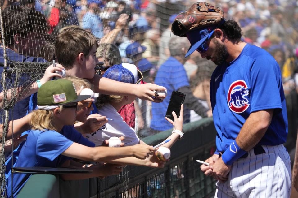 Chicago Cubs shortstop Dansby Swanson signs autographs at Sloan Park on March 27, 2023. The Cubs were the top draw of the 15 teams hosting games in Maricopa County.