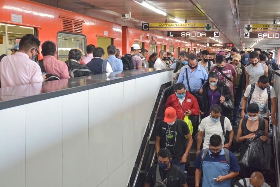 Commuters crowd together at Pantitlan station last week as restrictions across Mexico eased despite rising cases and deaths.