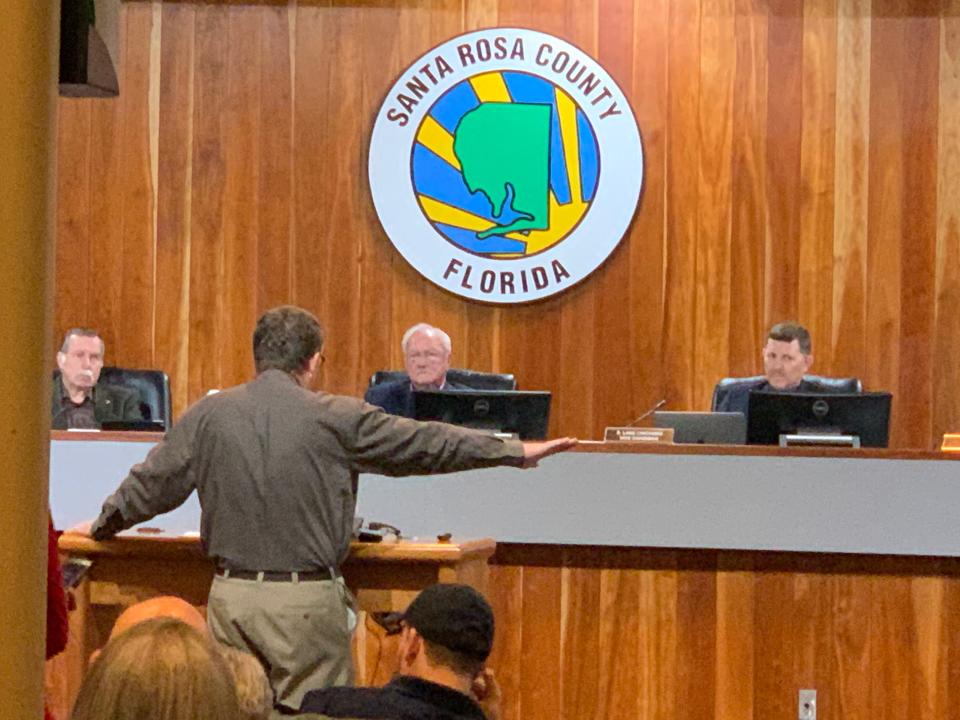 District 3 Commissioner and Board Chairman Don Salter, center, seated, blocks a "pro-life sanctuary" resolution from being put on the county's agenda in February 2020. Later that year, voters approved a referendum that symbolically declared the county as anti-abortion.