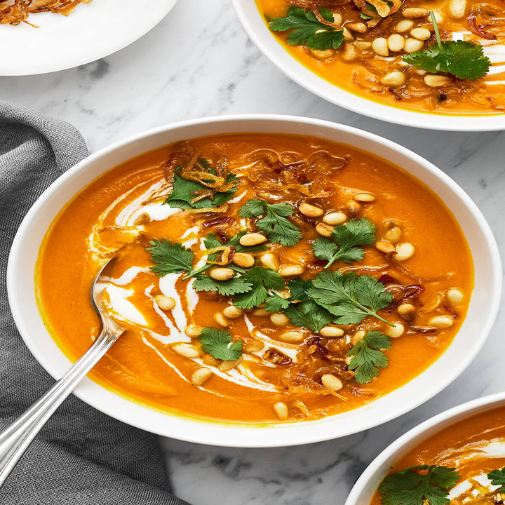 Carrot soup in bowls.