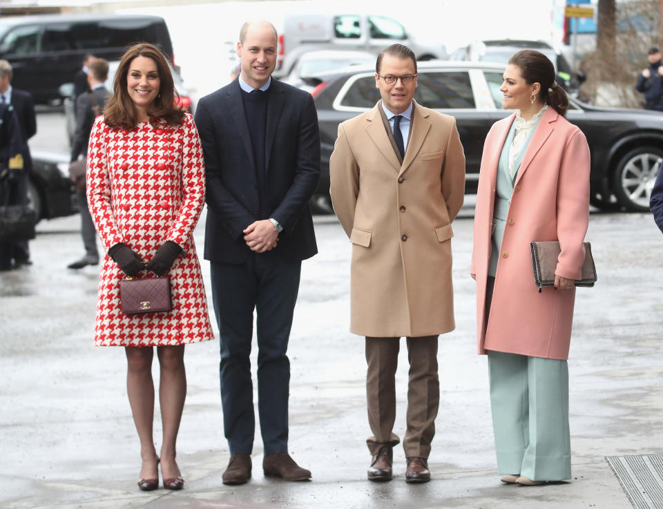 Crown Princess Victoria was just as fashion-forward with her outfit, dressed in a pastel trouser suit paired with a Stella McCartney bag. [Photo: Getty]