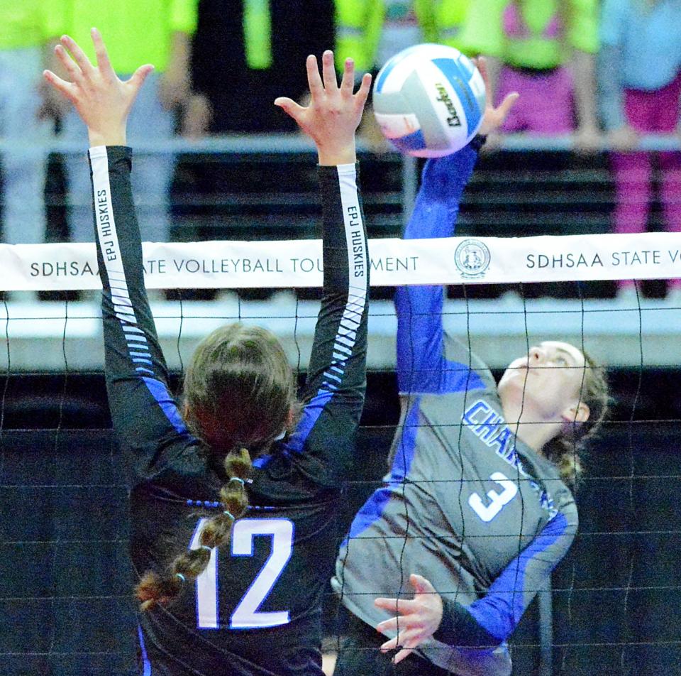 Sioux Falls Christian's Peyton Poppema spikes the ball against Elk Point-Jefferson's Ashley Brewer during their Class A semifinal match in the state high school volleyball tournament on Friday, Nov. 18, 2022 in the Denny Sanford PREMIER Center.