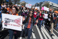 <p>Students march to the Capitol on Pennsylvania Avenue to call on Congress to act on gun violence prevention during a national walkout on April 20, 2018, which marks the 19th anniversary of the Columbine High School shooting in Colorado. (Photo: Tom Williams/CQ Roll Call/Getty Images) </p>