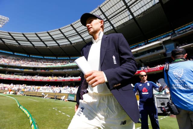 Joe Root walks out for the toss in Melbourne as England captain