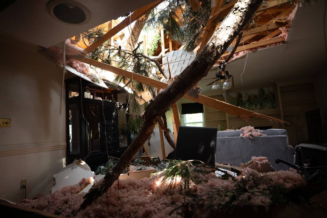 Tornado damage to Joy and John Bashore’s living room in Rocky Mount, N.C. is shown on Thursday, July 20, 2023. A tornado swept through the area on Wednesday, with several trees falling on the roof of the Bashore’s residence. Joy said she was inside the house with her dog when the tornado hit, and waited in the hallway until the storm passed. Neither Joy nor her dog were injured.