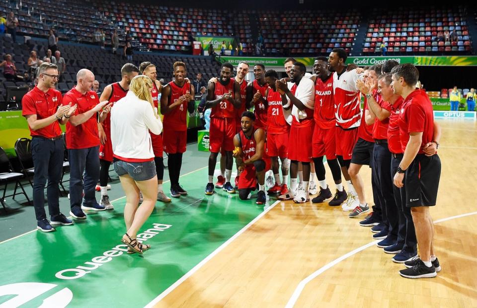 Team England basketball player Jamell Anderson proposes to fellow basketball player Georgia Jones on court at the Commonwealth Games (Pic Team England)