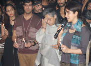 The protesters lit candles and talked about the need for protecting women.