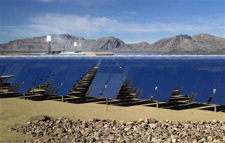 Heliostats (mirrors that track the sun and reflect the sunlight onto a central receiving point) are shown during a tour of the Ivanpah Solar Electric Generating System in the Mojave Desert near the California-Nevada border February 13, 2014. REUTERS/Steve Marcus