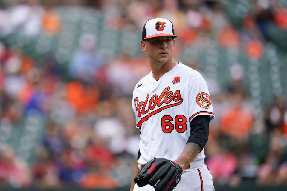 Baltimore Orioles starting pitcher Tyler Wells heads to the dugout after pitching to the Cleveland Guardians during the first inning of a baseball game, Monday, May 29, 2023, in Baltimore. (AP Photo/Julio Cortez)